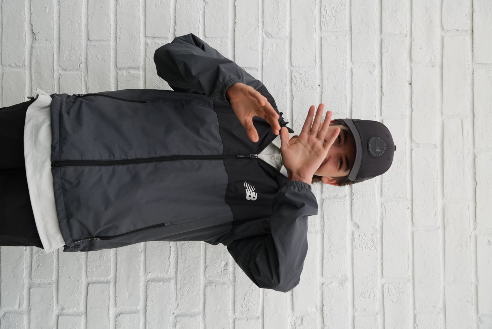 Boston Healy in a dark jacket and cap