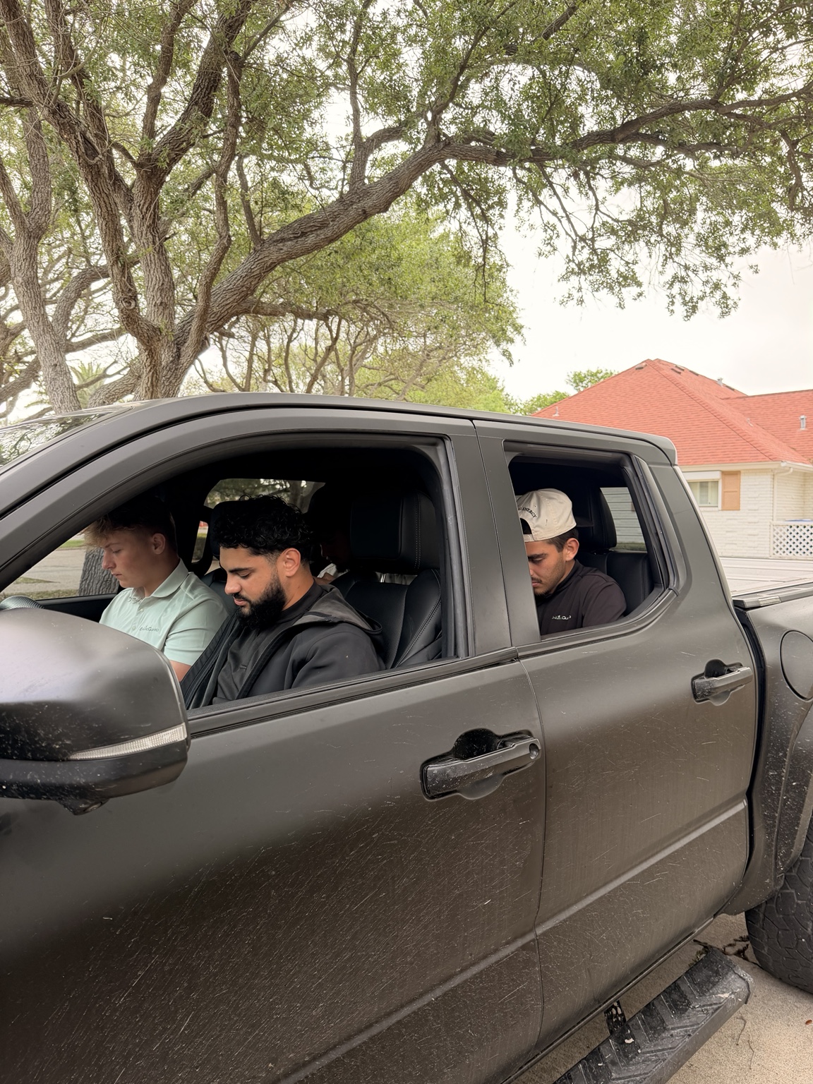 Rally representatives riding together in a pickup truck